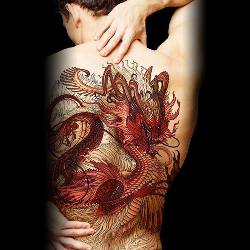 Fine line red dragon tattoo located on the forearm.
